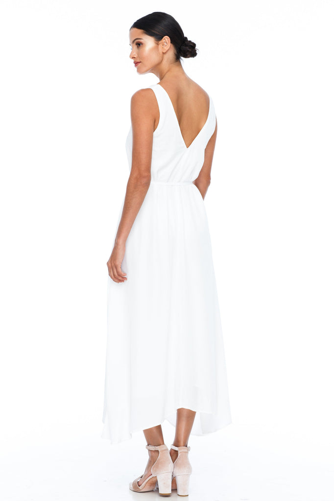 BLAK BRIDESMAIDS -  Calm Dress - White - Featuring a low v-neckline front and back with wider straps. An easy fit dress with self-waist tie.  Midi Length / 100% viscose.